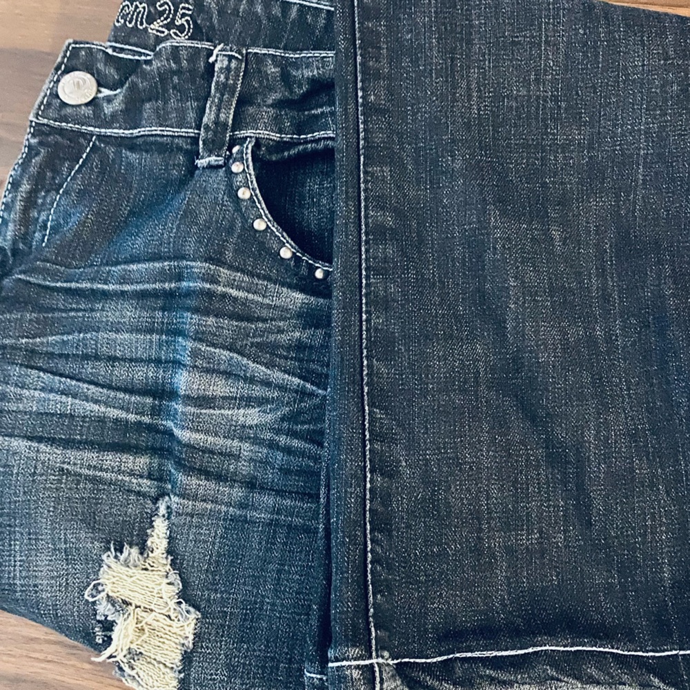 Ten 25 Ladies Blue jean pants size 16 gently worn very cute the color is blue